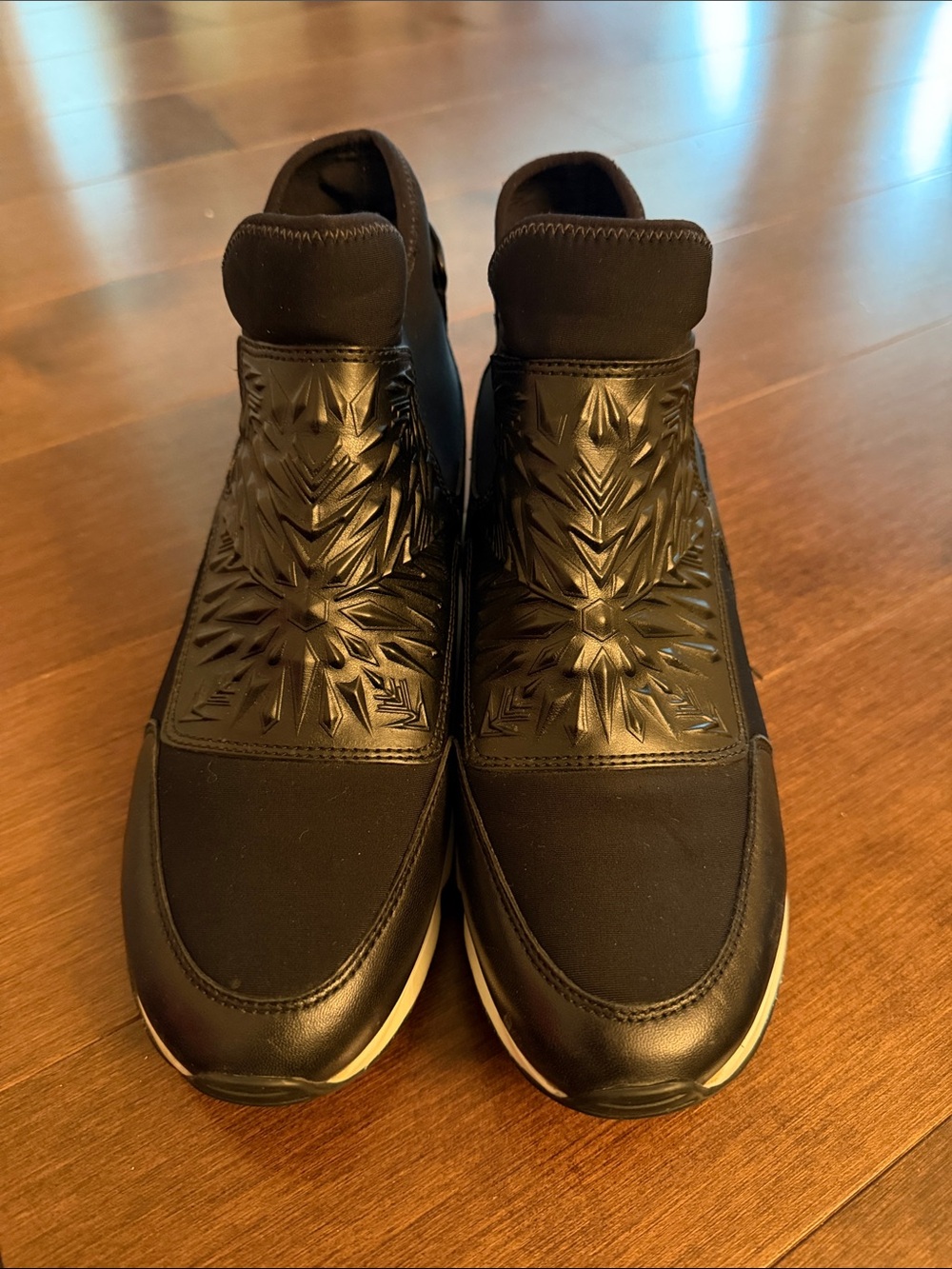 Ash Black Embossed Slip-On Sneakers